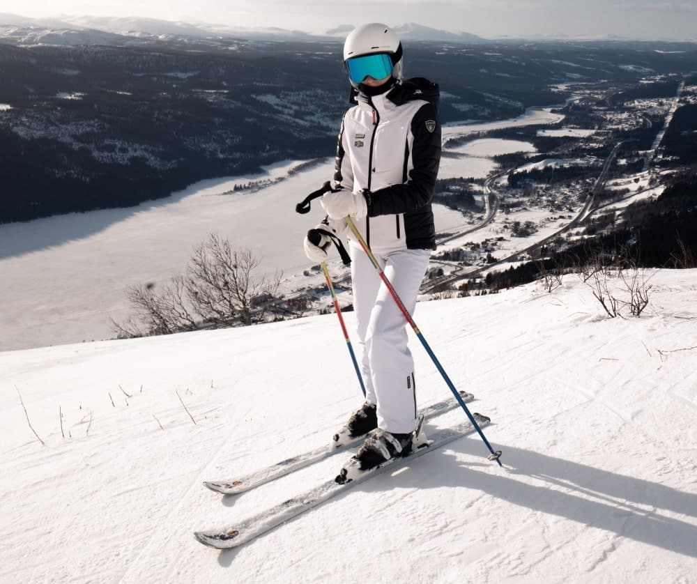 skier in full white equipment